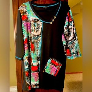 Tunic top with 3/4 length sleeves with solid black and prints in blocks